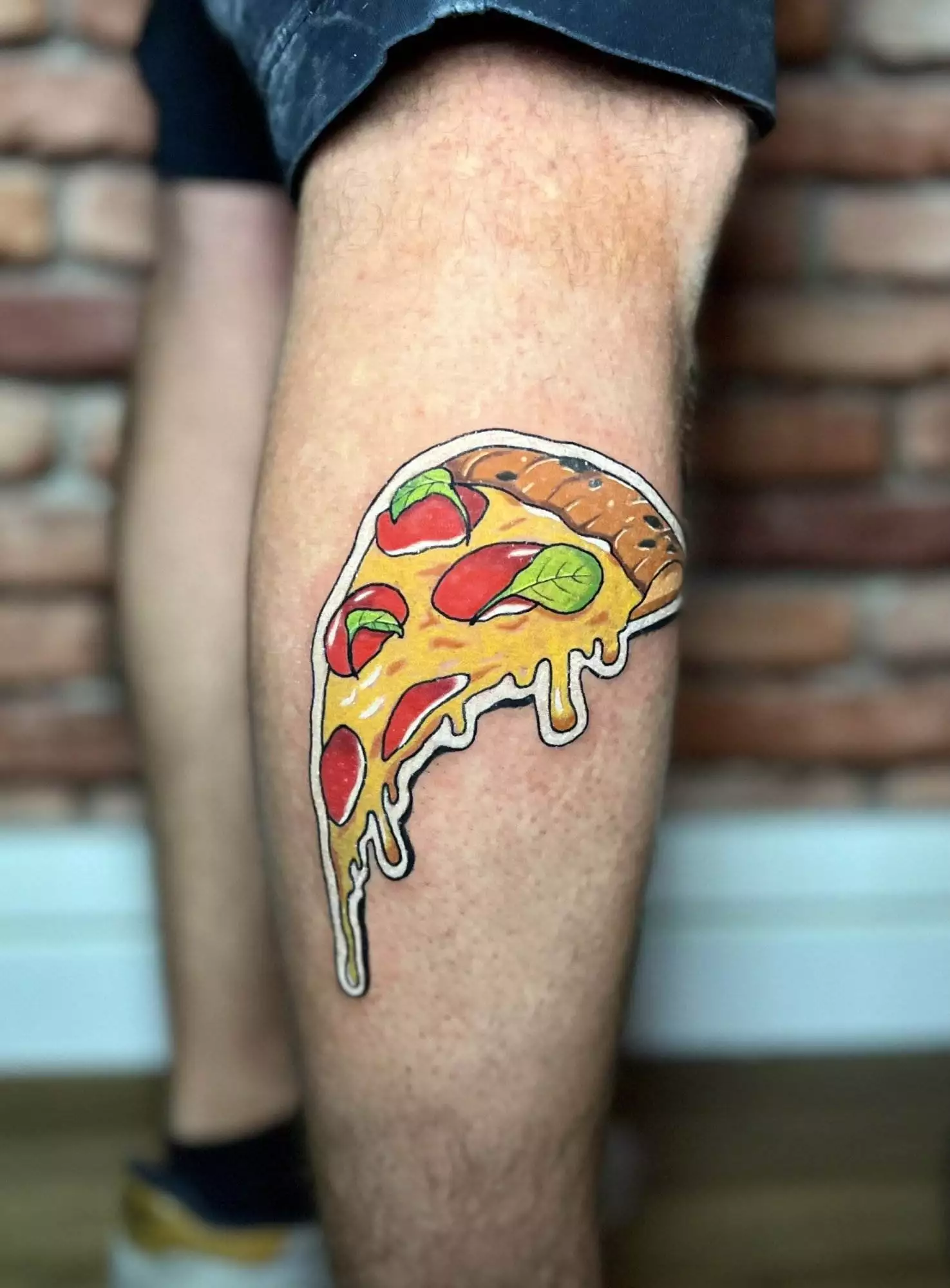 Tatouage couleur ou tatouage noir et blanc