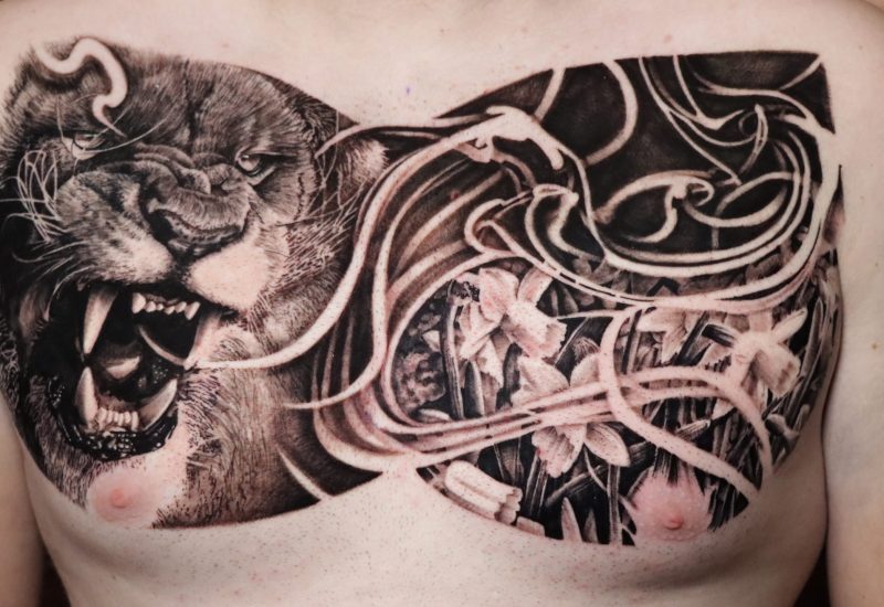Le tatouage de lion et de lionceau : un symbole parfait pour l'amour